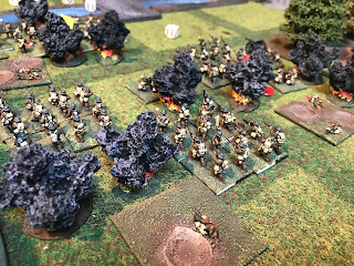 The British infantry and support weapons are slowed by German artillery