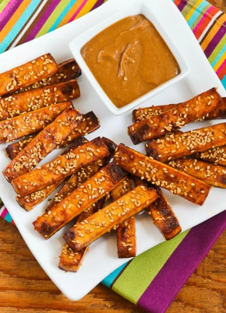 Baked Sesame Tofu Sticks with Peanut Butter, Tahini, and Ginger Sauce