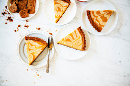 pumpkin pie with a speculoos cookie crust and a crème fraîche swirl