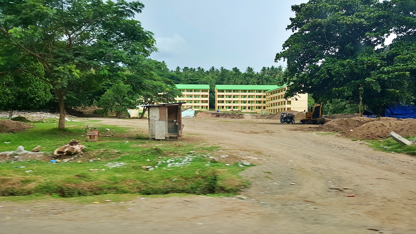 a new 4-storey building being constructed at Malapatan National High School