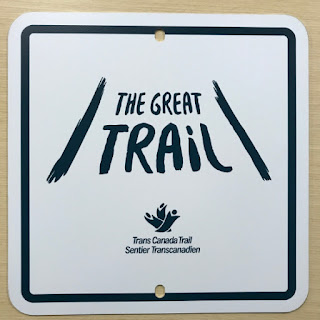 The Great Trail sign and logo.