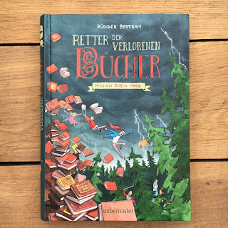 "Retter der verlorenen Bücher: Mission Robin Hood" von Rüdiger Bertram, illustriert von Horst Hellmeier, erschienen im Ueberreuter Verlag