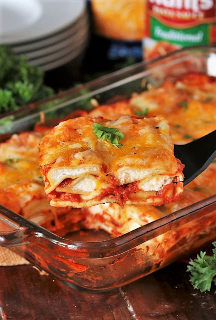 Serving a Square of Lazy Lasagna with a Spatula Image