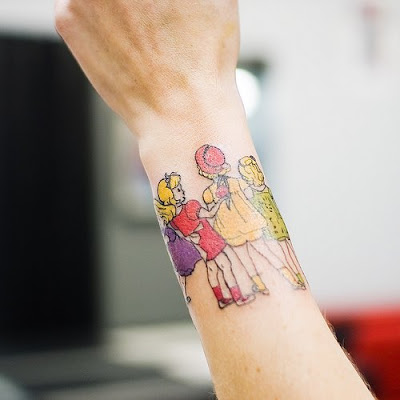 I've never felt compelled to get a tattoo (too wussy!), but how rad are:
