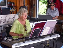 Barbara Powell playing the Tyros 5 whilst hubbie, Rob, accompanies on the Korg SP-250 digital piano. Any connection to John Belushi of The Blues Brothers fame is denied!