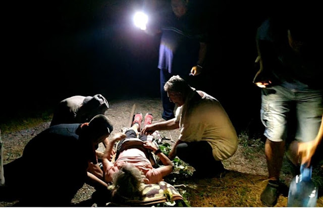 Local residents helping the German tourist after the incident