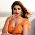 Actress Nidhhi Agerwal Latest Photoshoot Stills in Orange Dress