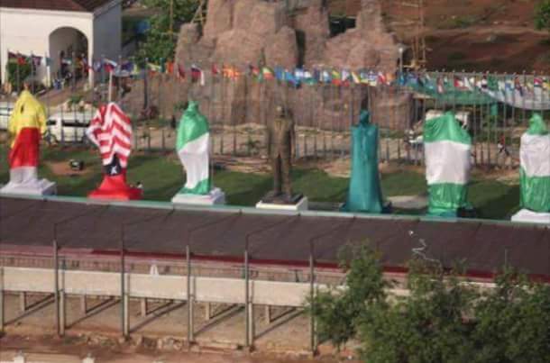 The covered statues beside Jacob Zuma