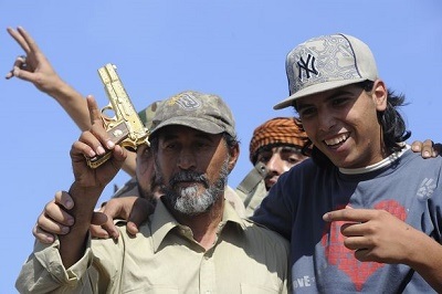 UNSEEN FOOTAGE: The Moment Libyan Dictator, Gaddafi Was Captured And Lynched By Angry Mob (Photos + Video)