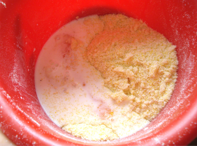 egg and milk in corn semolina mixture
