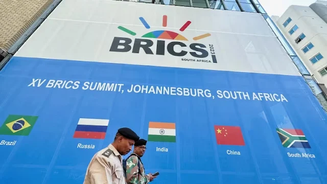 Image Attribute: Security personnel patrolled near the Sandton Convention Centre in Johannesburg, South Africa, on Saturday. This venue is hosting a summit gathering the BRICS economic alliance from Tuesday onwards, comprising Brazil, Russia, India, China, and South Africa. / Source: James Oatway / REUTERS