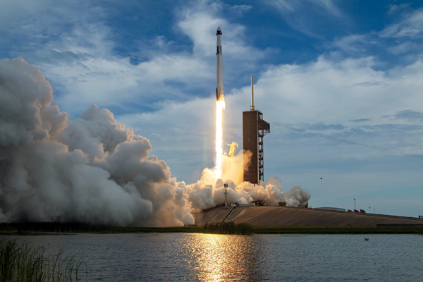 SpaceX's Falcon 9 rocket carrying Crew Dragon Freedom and the Axiom Mission 2 astronauts lifts off from Launch Complex 39A at NASA's Kennedy Space Center in Florida...on May 21, 2023.