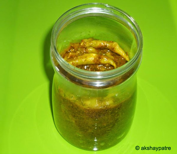 Green chilli pickle in a jar