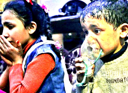 This image released early April 8, 2018 by the Syrian Civil Defense White Helmets, shows a child receiving oxygen through respirators following an alleged poison gas attack in the rebel-held town of Douma, near Damascus, Syria. Syrian rescuers and medics said the attack on Douma killed at least 40 people. The Syrian government denied the allegations, which could not be independently verified. The alleged attack in Douma occurred Saturday night amid a resumed offensive by Syrian government forces after the collapse of a truce.