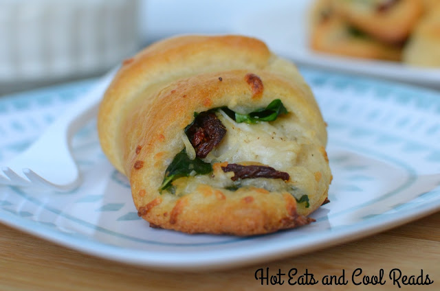 Great served as an appetizer, lunch or side! So delicious and flavorful! Cheesy Chicken, Sun Dried Tomato and Spinach Crescent Rolls Recipe from Hot Eats and Cool Reads