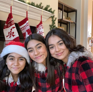 Mercedes Lomelino clicking selfie with her siblings