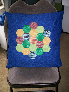 Appliqued hexagon throw pillow