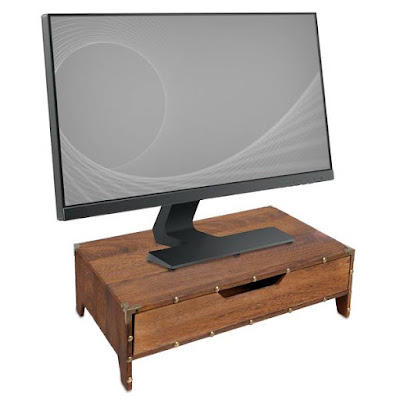 Using a wooden monitor stand computer riser.