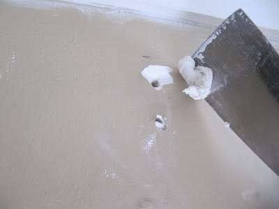 removing plastic wall anchors