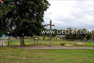 Wiszniew. Catholic church of St. Mary. Catholic cross from 1928 year