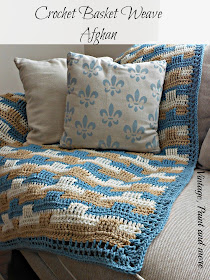 A basket weave crochet afghan done in coastal colors with Red Heart Yarn