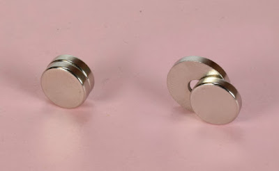 Using the illustration of magnet and steel, it is easy to understand.