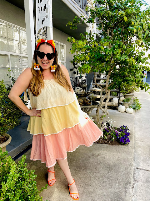 Jamie Allison Sanders is showing off her Halloween Spooky Season looks in a Free the Roses dress from Nuuly for Candy Corn Week.