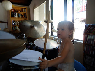 Playing Uncle Adamen's drums
