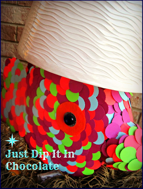 DIY Tide Pods Fish Lamp, for only a few dollars create this whimsical lamp with that empty container! Great kid's project with a little of mom's help.