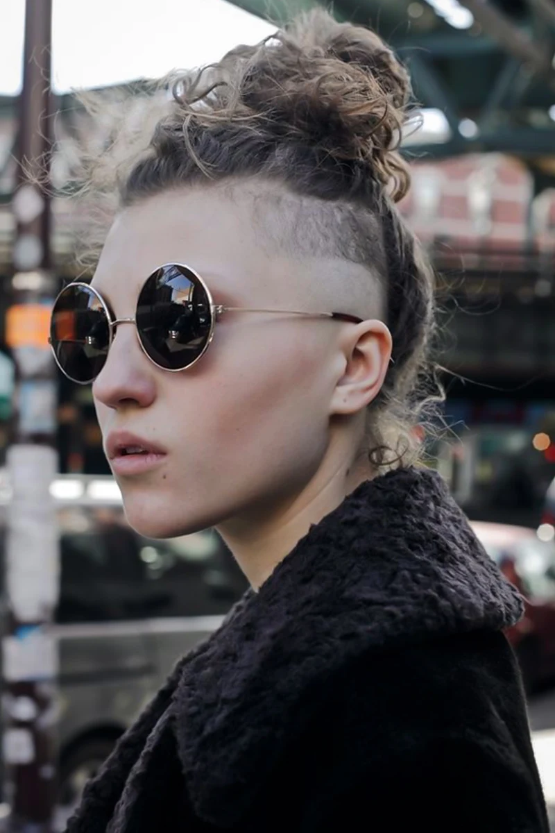 beautiful portrrait of a young woman with goth hairstyle