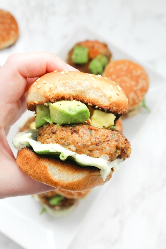 These Zesty Brown Rice Black Bean Vegan Sliders with Basil Aioli are the perfect party appetizer. Topped off with an avocado & tomato salsa.