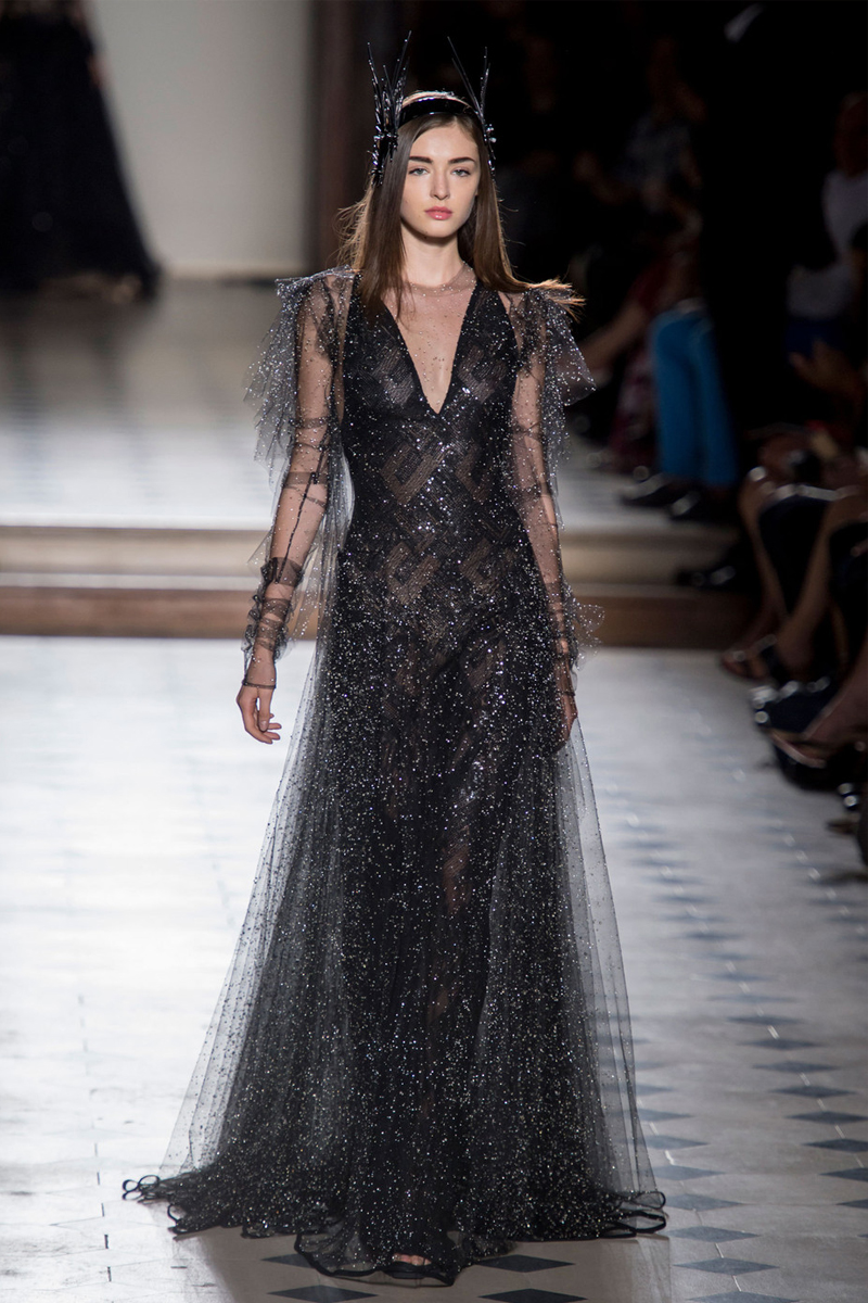 model in a black gothic dress at the Julien Fournie fashion show