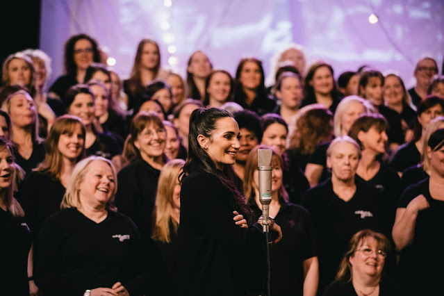 Laura Wright with the Military Wives Choirs (Photo Rosie Powell)