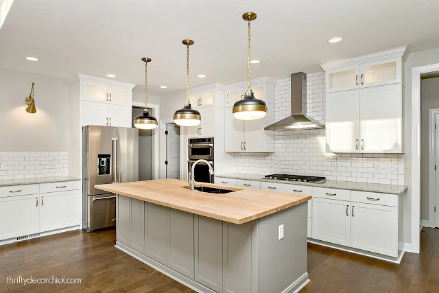 White kitchen butcher block counter island 