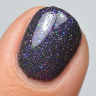 charcoal nail polish with purple and holo glitter