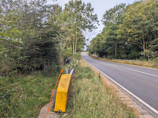 Continue following the path downhill to a junction