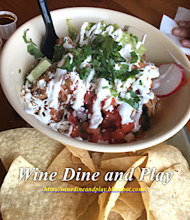 At the Casita Taqueria in St. Petersburg, Florida a California style 'Casita bowl' comes with your choice of meat or vegetables, beans, rice, guacamole, queso fresco cheese, crema, cilantro and pico de gallo. Served with choice of chips or 3 homemade corn tortillas. 