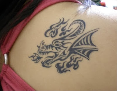 head dragon tribal tattoo for women