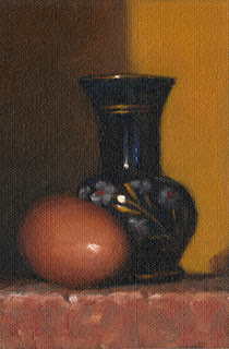 Still life oil painting of an egg beside a small blue glass vase with painted flowers.