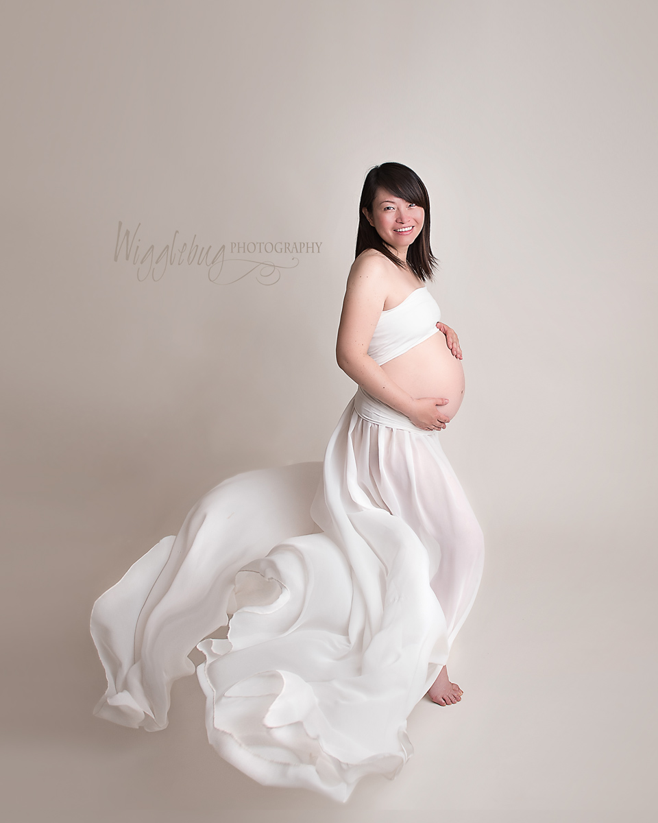 Studio Maternity Photo in an ivory gown by Wigglebug Photography, DeKalb , Sycamore Area Photographer