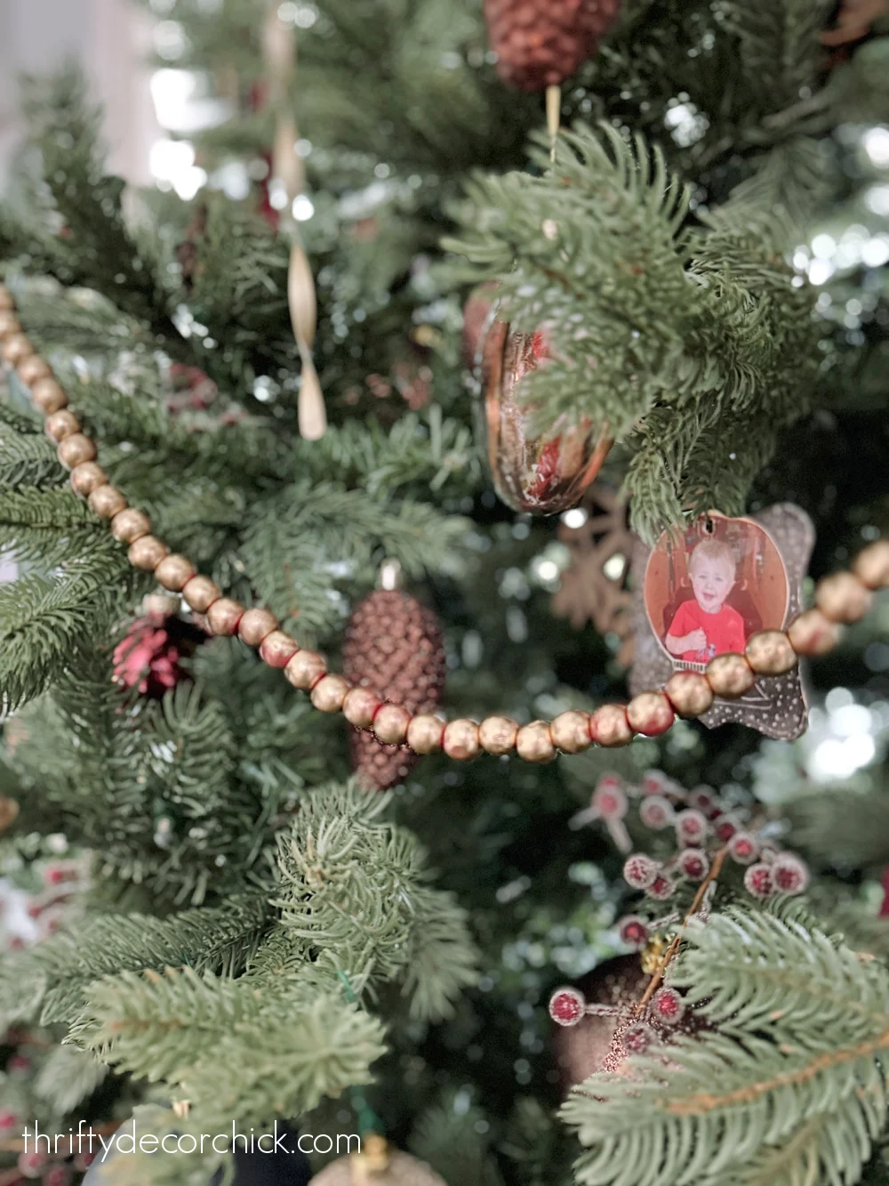 gold beaded garland on tree