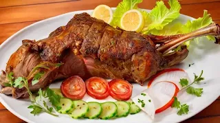 Juicy Mutton Leg Roast served on a platter, garnished with fresh herbs and accompanied by roasted vegetables.