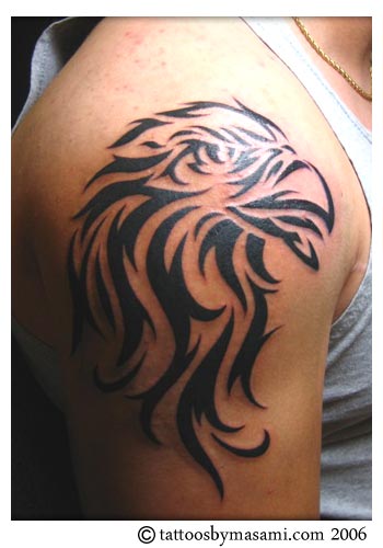 chest and shoulder tribal tattoo Most of the modern tattoos are based on