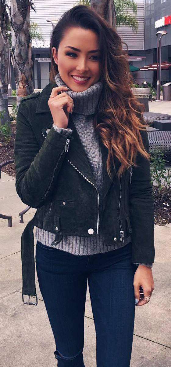 cute outfit idea: grey knit + biker jacket + rips