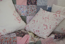 Cushions on quilt