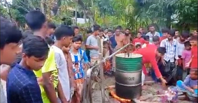 College students burning abandoned polythene in Kurigram to produce petrol and diesel!