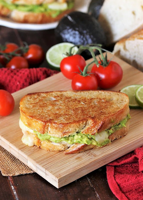Whole Guacamole Grilled Cheese on Cutting Board Image
