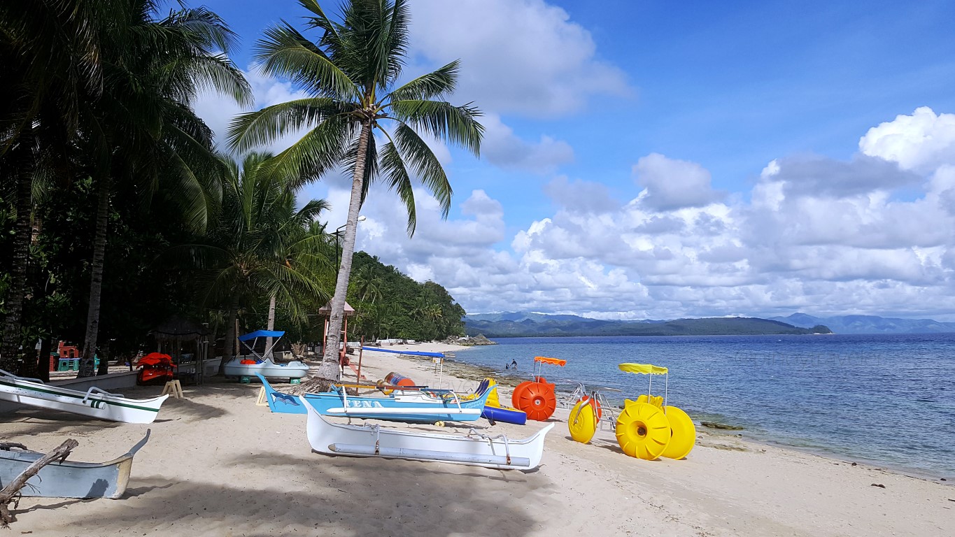 fine white sand beach at Isla Jardin Del Mar Resort in Glan, Sarangani