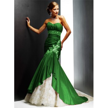 This is a beautiful green dress the shape and cut is just stunning