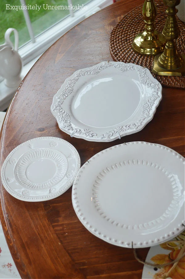 Three White Decorative Plates